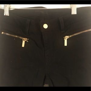 Black Michael Kors jeans with gold details